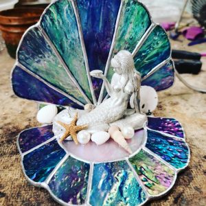 Cast Mermaid sitting in a Stained Glass Clam Shell